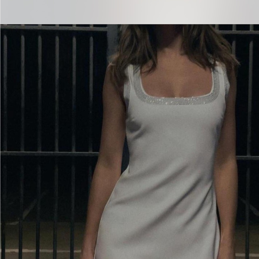 White Sleeveless Dress with Silver Accents